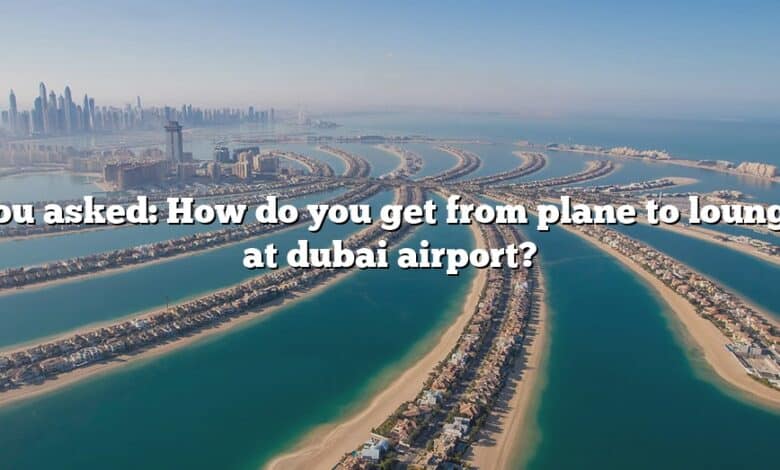 You asked: How do you get from plane to lounge at dubai airport?